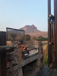 Traditional African braai with mountain views in Southern Africa